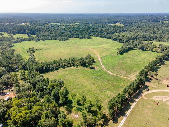 birds eye view of property featuring a rural view