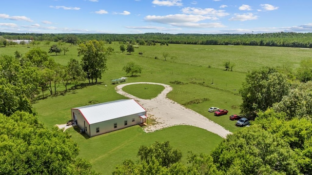 birds eye view of property featuring a rural view