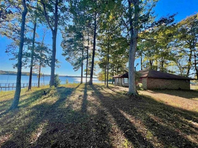 122 Isle Dr, Hemphill, TX 75948 - view of yard featuring a water view