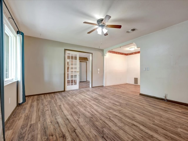 1313 Glass Ave, Diboll, TX 75941 - empty room with ceiling fan and wood finished floors