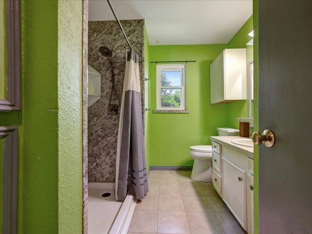 1313 Glass Ave, Diboll, TX 75941 - bathroom with vanity, tile patterned floors, and a shower with shower curtain