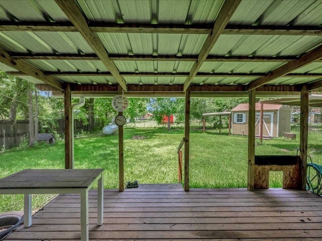 1313 Glass Ave, Diboll, TX 75941 - deck featuring a storage unit and a fenced backyard