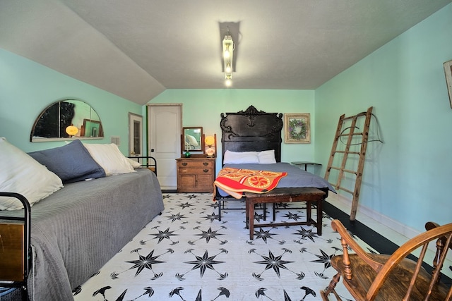 bedroom featuring vaulted ceiling