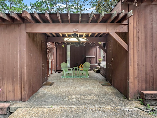 view of patio / terrace featuring ceiling fan