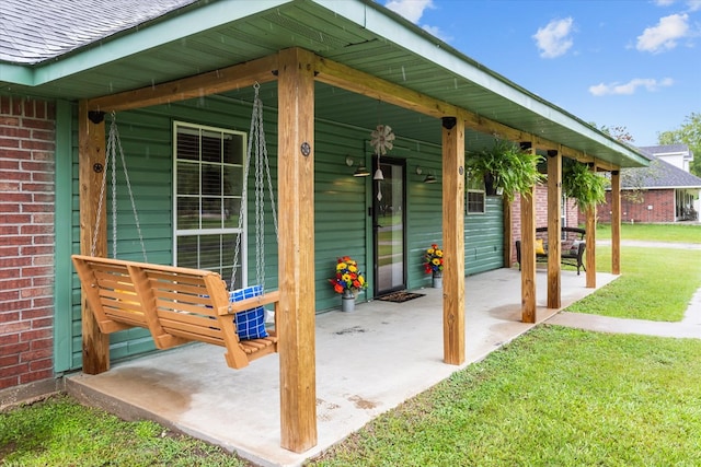 view of patio featuring a porch