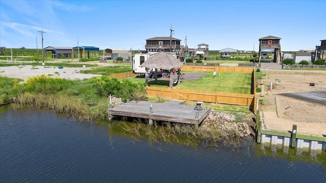 dock area featuring a gazebo and a water view