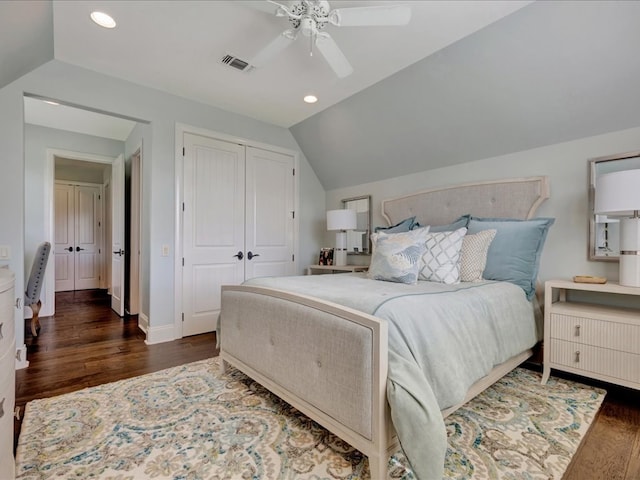 bedroom with wood finished floors, lofted ceiling, recessed lighting, ceiling fan, and a closet