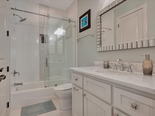 1811 Caspers Cv, Lufkin, TX 75904 - full bathroom featuring vanity, bath / shower combo with glass door, and tile patterned flooring