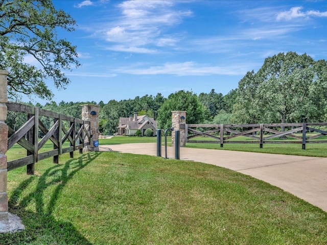 view of community featuring a yard