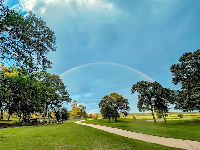 1811 Caspers Cv, Lufkin, TX 75904 - surrounding community featuring a lawn and view of golf course