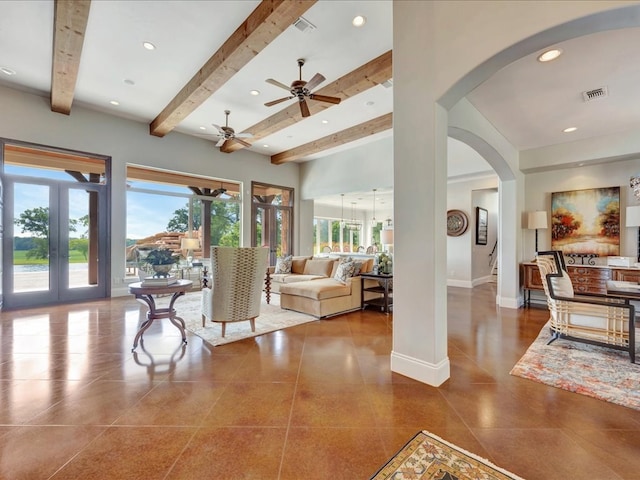 living area with recessed lighting, visible vents, beam ceiling, and baseboards