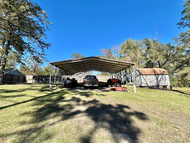 670 Cedar Crest Cir, Hemphill, TX 75948 - view of car parking with a shed and a detached carport