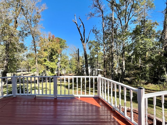 670 Cedar Crest Cir, Hemphill, TX 75948 - deck featuring view of scattered trees