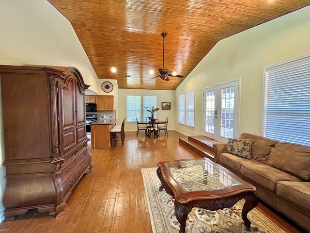670 Cedar Crest Cir, Hemphill, TX 75948 - living area featuring wood ceiling, light wood-style floors, a ceiling fan, and high vaulted ceiling