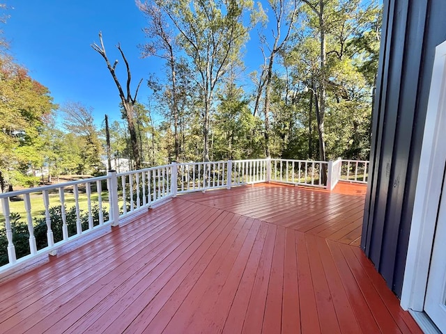 670 Cedar Crest Cir, Hemphill, TX 75948 - wooden terrace featuring view of scattered trees