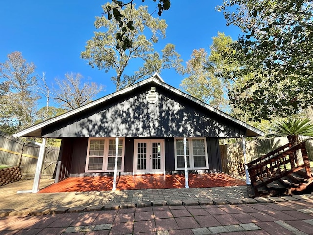 670 Cedar Crest Cir, Hemphill, TX 75948 - back of house featuring french doors