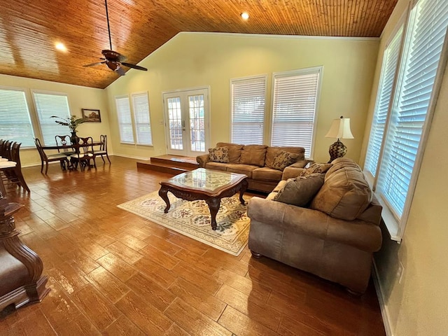 670 Cedar Crest Cir, Hemphill, TX 75948 - living room featuring a ceiling fan, wood ceiling, wood finished floors, plenty of natural light, and vaulted ceiling