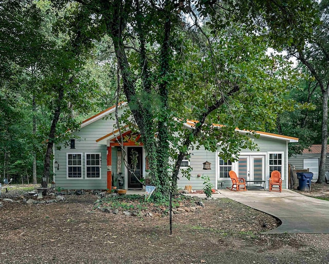 view of front of home with a patio area