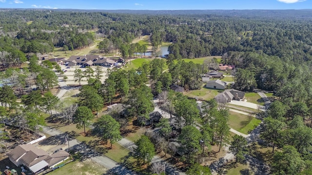 aerial view featuring a residential view and a forest view