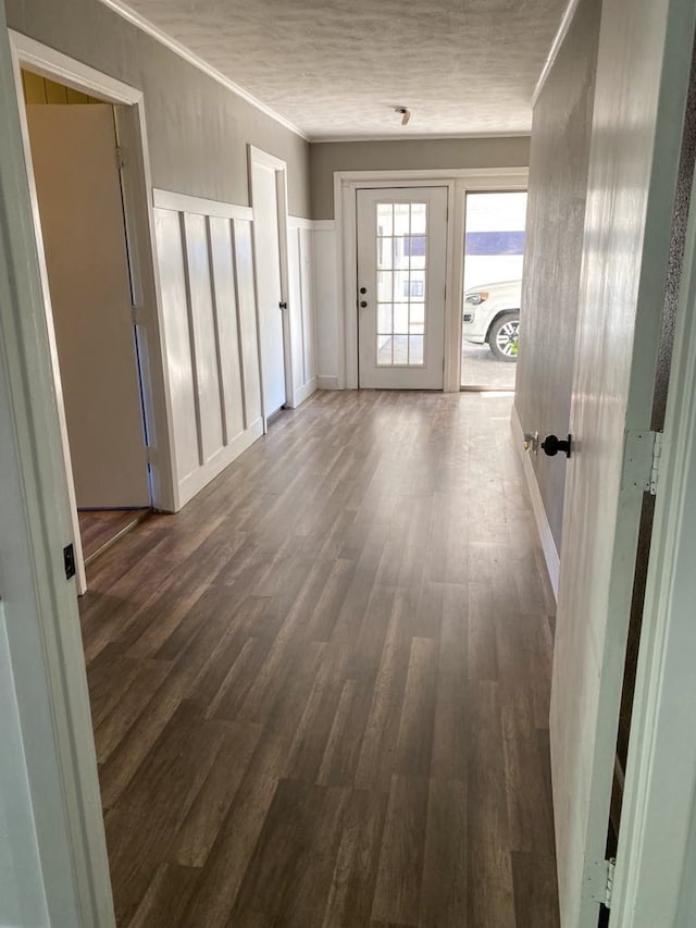 hallway featuring dark hardwood / wood-style floors