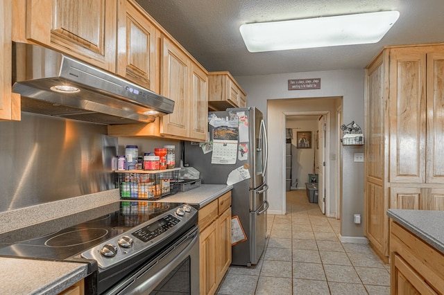 1500 New Haven Rd, Hemphill, TX 75948 - kitchen with a textured ceiling, ventilation hood, stainless steel appliances, light brown cabinets, and light tile patterned floors