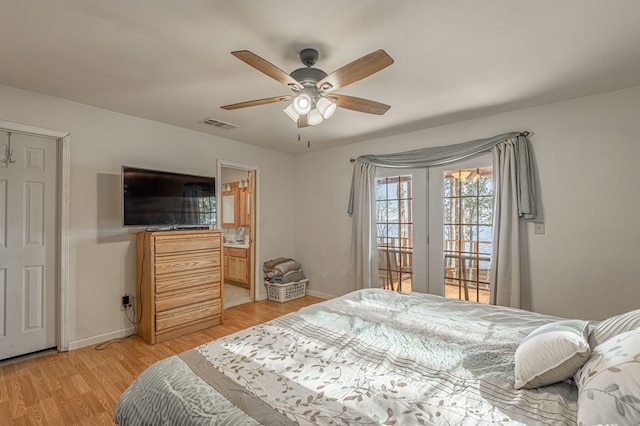 1500 New Haven Rd, Hemphill, TX 75948 - bedroom featuring ensuite bath, ceiling fan, and light wood-type flooring