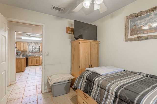 1500 New Haven Rd, Hemphill, TX 75948 - bedroom featuring a textured ceiling, ceiling fan, light tile patterned floors, and sink