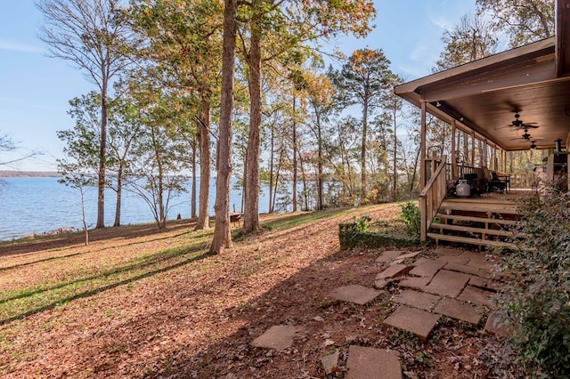 1500 New Haven Rd, Hemphill, TX 75948 - view of yard with ceiling fan and a water view