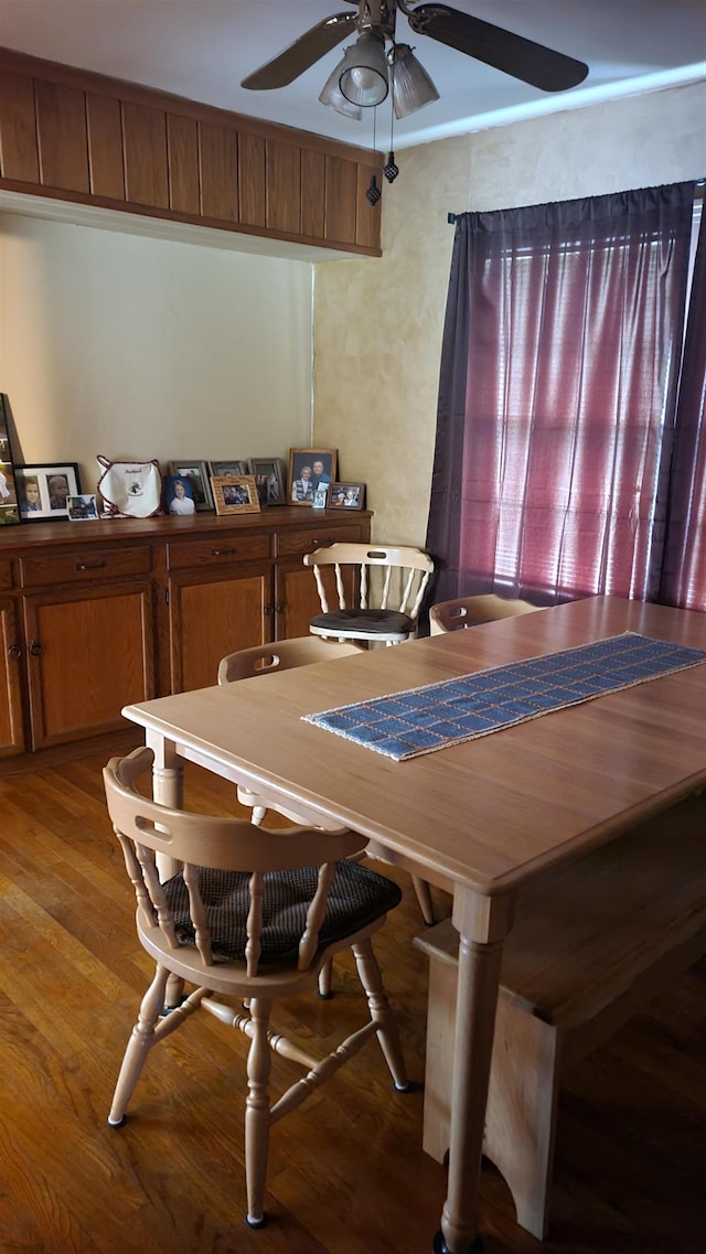 dining area with hardwood / wood-style flooring