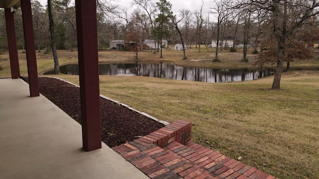 view of yard with a water view