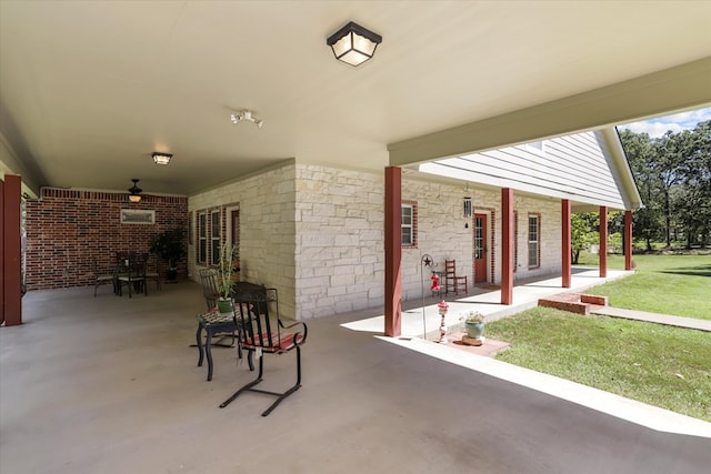 view of patio with ceiling fan