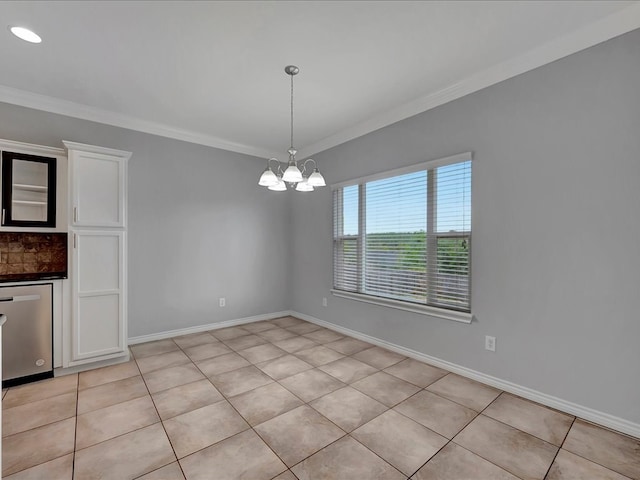 unfurnished dining area with light tile patterned floors, crown molding, and an inviting chandelier