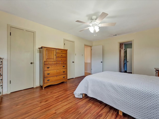 bedroom featuring ceiling fan and wood-type flooring