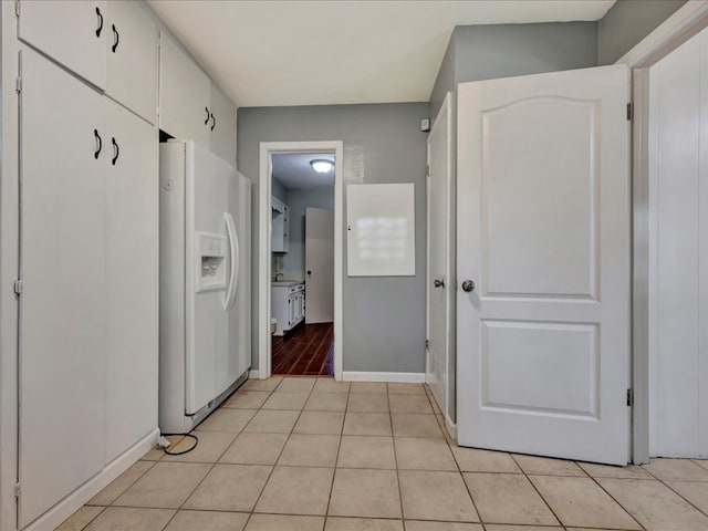 interior space featuring light tile patterned flooring