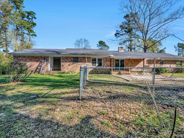 single story home with a front yard