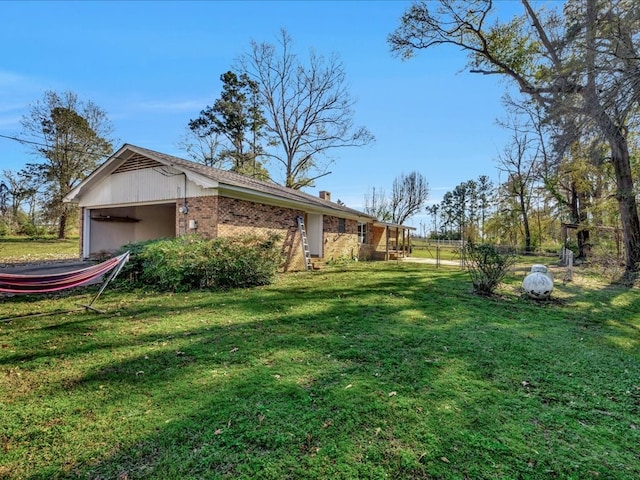 view of yard featuring a garage