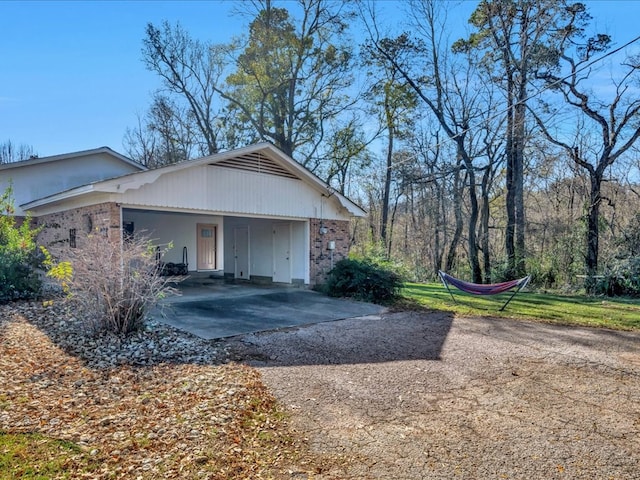 exterior space with a carport