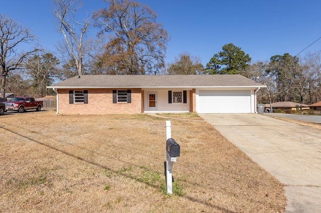 ranch-style home with a garage and a front yard