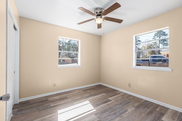 unfurnished bedroom with wood-type flooring and ceiling fan