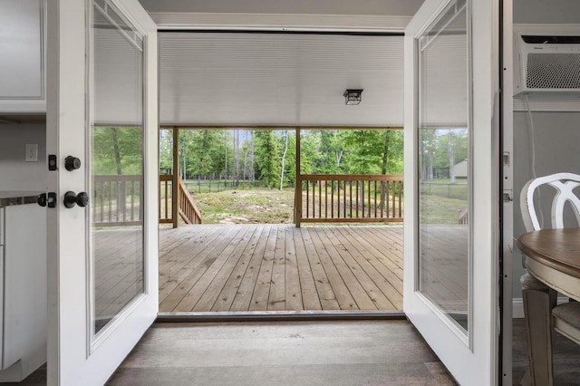 doorway to outside with dark hardwood / wood-style flooring