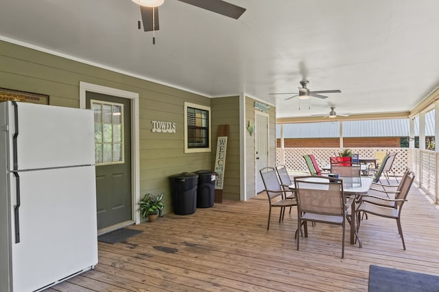 264 Wildbriar Dr, Jasper, TX 75951 - deck featuring ceiling fan and outdoor dining space