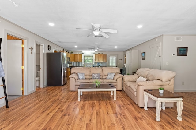 264 Wildbriar Dr, Jasper, TX 75951 - living area featuring light wood finished floors, ceiling fan, recessed lighting, and baseboards