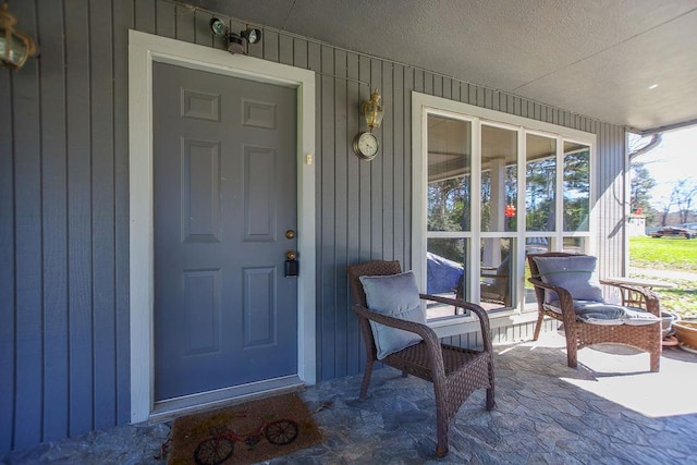 entrance to property with a porch