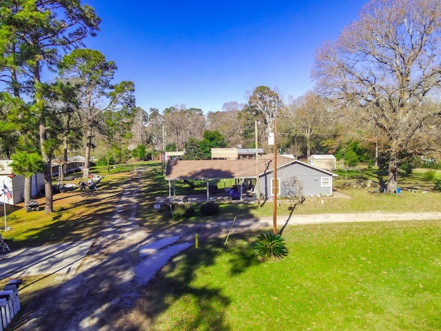 exterior space featuring a front lawn