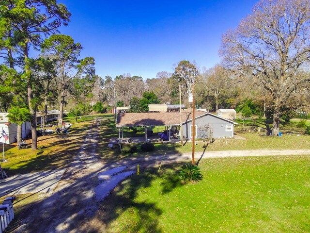 view of yard featuring a carport