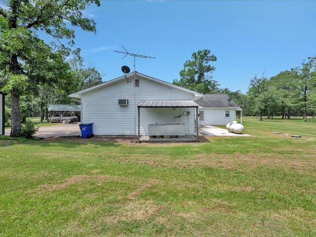 21441 Fm 705, Broaddus, TX 75929 - rear view of property featuring a lawn