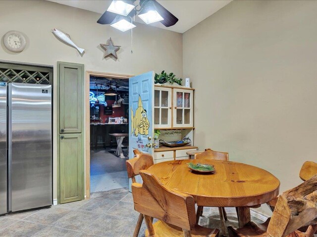21441 Fm 705, Broaddus, TX 75929 - dining space with lofted ceiling, a ceiling fan, and a skylight