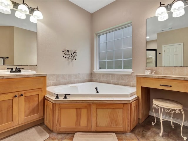 7830 Fm 3150, Lufkin, TX 75904 - bathroom featuring two vanities, a bath, a shower stall, and tile patterned flooring