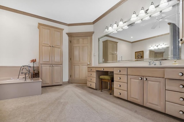 bathroom with ceiling fan, a bathtub, vanity, and ornamental molding