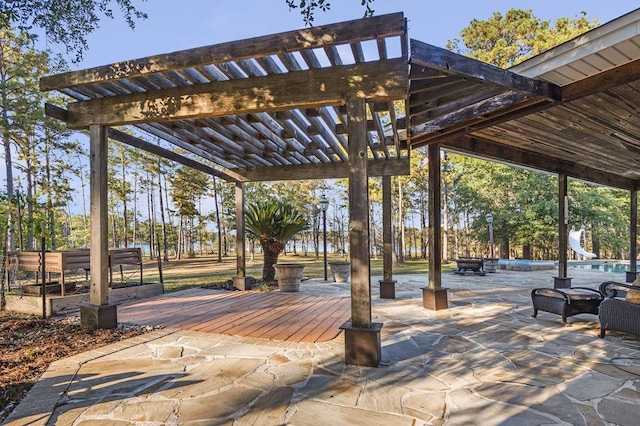 surrounding community with a pergola and a patio